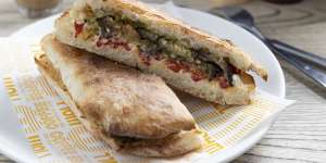 Roast capsicum pide with goat’s cheese,eggplant and pesto.