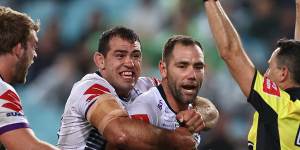 Cameron Smith celebrates during the Storm's 26-20 grand final win over Penrith.