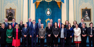 Members of the new-look Victorian ministry pose for a group photo at Government House during the swearing-in ceremony last month.