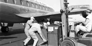 Two insulated containers of Salk vaccine for polio arrive at Mascot Airport in Sydney,June 1956. 