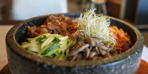 Sizzling:Bibimbap with spicy chicken.