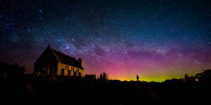 The southern lights photographed across Lake Tekapo in New Zealand.
