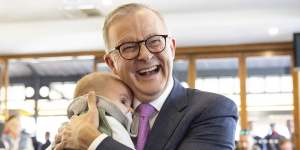 Government to use boosted paid parental leave to entice fathers to do more caring