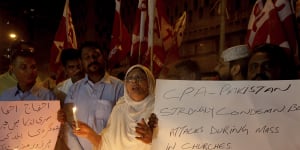 Pakistanis hold a vigil for the for victims of the Sri Lanka attacks,in Karachi,Pakistan.