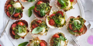 Danielle Alvarez’s scallops baked in the half-shell with tomatoes and herbed breadcrumbs.