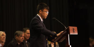Takuya Tokairin,a survivor of the 2011 Tohoku earthquake,speaks to students in Canberra. 