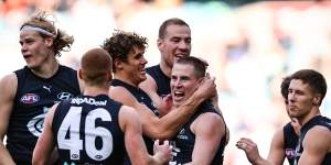 Carlton have thrashed the Suns to break a losing streak.