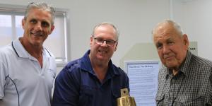 From left,Cr Tim Dwyer,Landsborough Historical Society Management Committee member Tim Venter and Peter Olds with one of the SS Dicky replica bells,which will be on public display at the Landsborough Museum.