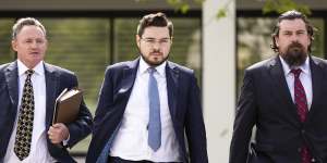 Bruce Lehrmann,left,with John Macgowan,arriving at court in 2022.