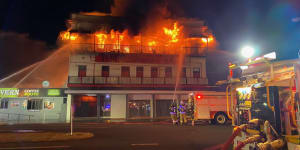 80 people escape uninjured as historic Queensland backpackers'hostel burns