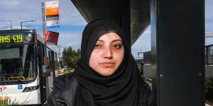 Public transport commuter Syed Zahra at the bus stop outside the St Albans train station where she commutes to for work. She spends $24 on Uber to get from a housing estate to Rockbank train station to get to work because there are no buses. Photo Luis Ascui