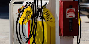 Sold-out signage at petrol bowsers at Shell Reddy Express.