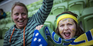 Lenny Daymond,8,and his mum Claudia watched the Matildas play Sweden at the AAMI Park live site. 