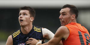 Ned Reeves (left) and Jonathon Ceglar contest the ruck during a Hawks’ intra-club match. 