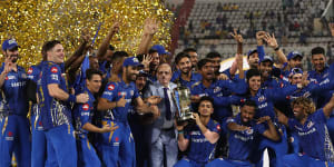 The Mumbai Indians celebrate after they defeated the Chennai Super Kings during the Indian Premier League Final match between the the Mumbai Indians and Chennai Super Kings at Rajiv Gandhi International Cricket Stadium on May 12,2019