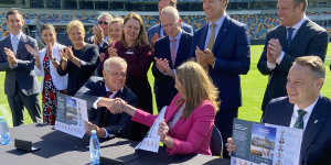 Prime Minister Scott Morrison,Queensland Premier Annastacia Palaszczuk and Brisbane lord mayor Adrian Schrinner signing the SEQ City Deal at the Gabba.