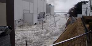 How it all began ... TEPCO has released pictures of flooding at its Fukushima Dai-ichi nuclear power plant when the March 11 tsunami hit.
