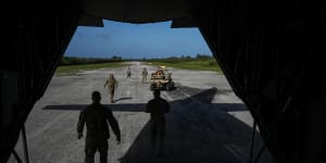 American airmen unload equipment on one of World War II-era runways on the Pacific isle of Tinian,Northern Mariana Islands,on February 17,2023.