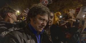 Far-right presidential candidate Javier Milei greets supporters during a rally in Argentina