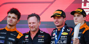 Lando Norris (left) and teammate Oscar Piastri (right) with Red Bull team principal Christian Horner and Japanese F1 Grand Prix winner Max Verstappen.