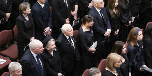 Former prime ministers (middle row R-L) Scott Morrison with wife Jenny,John Howard with wife Janette,and Paul Keating at the service.