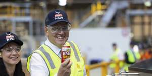 Scott Morrison comfortable standing out in high-vis gear on the campaign trail.