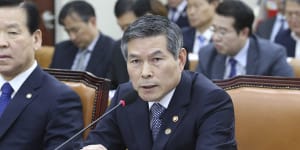 South Korean Defence Minister Jeong Kyeong-doo answers a lawmaker's question about North Koreans'deportation at the National Assembly in Seoul,South Korea. 