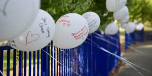 Tributes left at Hillcrest Primary School following the death of five children in a jumping castle accident.