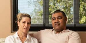 Wallabies legend Toutai Kefu with his wife Rachel at their Brisbane home in October 2021 .