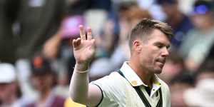 David Warner waves goodbye to the MCG crowd on what will be his last Test inning at the ground.