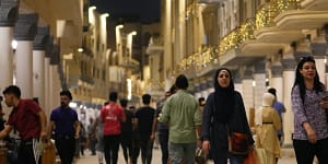 Evening shoppers on Baghdad’s Al-Mutanabbi street.