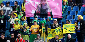 Liana France’s family with their custom flag made on strict instructions from the 16-year-old.