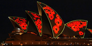 The Opera House displays poppies on the sails in recognition of Remembrance Day.