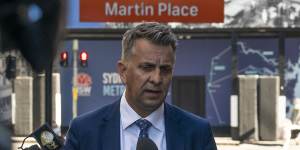 Minister for Transport and Roads Andrew Constance makes an announcement on public transport fares in Martin Place on Wednesday. 