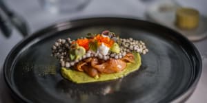Kingfish escabeche looks like an elegant clam perched atop a bed of avocado puree