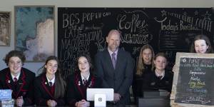 Balcombe Grammar principal Ross Patterson with students (left to right) Massimo,Emmerson,Kobi,Annali,Sophie and Indigo in their marketplace cafe.