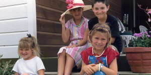 Jacinda (at front,in red and blue) with her sister Louise (in hat) and cousins Demelza and Aaron in 1987.