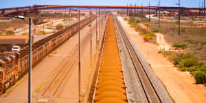 Fortescue says it will invest in renewable energy generation and battery storage to power a green mining fleet,electrifying its rail locomotive ore haulage system.