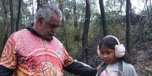 Gomeroi man Raymond Weatherall and his daughter in Pilliga Forest.