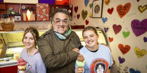 Jock Main from Jock’s Ice Cream&Sorbet in Albert Park with employees Greta Nusimovich Mateo,left,and Queenie Main,right,his daughter.