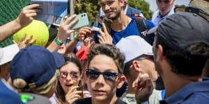 World No.2 Daniil Medvedev is mobbed by fans after training in the lead-up to the Geneva Open.
