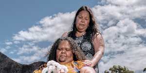 Karen Blanket (left) and Connie Moses-Penny at Fremantle Cemetery,where their sons are buried. Both young men died at Acacia Prison east of Perth.