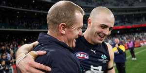Michael Voss,senior coach of the Blues and Alex Cincotta celebrate their win. 
