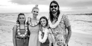 Dave Grohl with his wife Jordyn and daughters Violet,Harper and Ophelia.