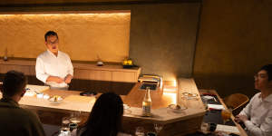 Chef Jun Oya cuts and cooks in front of guests at Shusai Mijo.