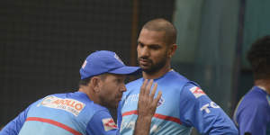 Ricky Ponting in discussion with Shikhar Dhawan during his role as Delhi Capitals coach in the IPL.