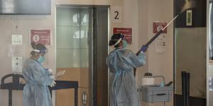Cleaners wearing full PPE at the Holiday Inn this week.