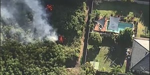 Crews keep bushfire flames from bayside Brisbane homes