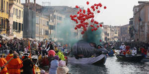 Carnival explodes with music and colour in Venice during winter.