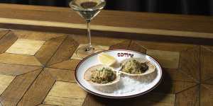 Abrolhos Island scallops are bathed in herb butter.